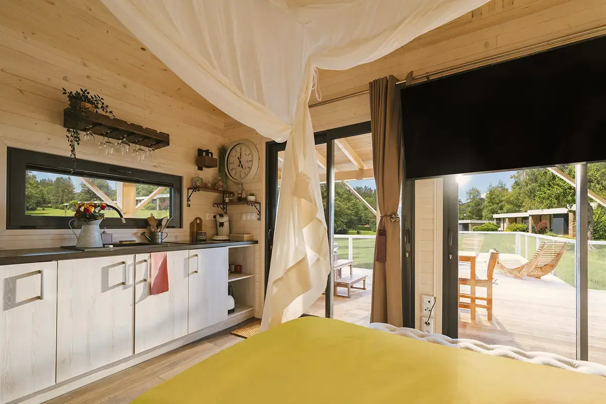 Quadrapol Chalet en bois Cabane du pecheur vue intérieur